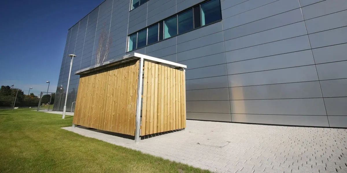 Outdoor wooden canopy cycle shelter infront of school