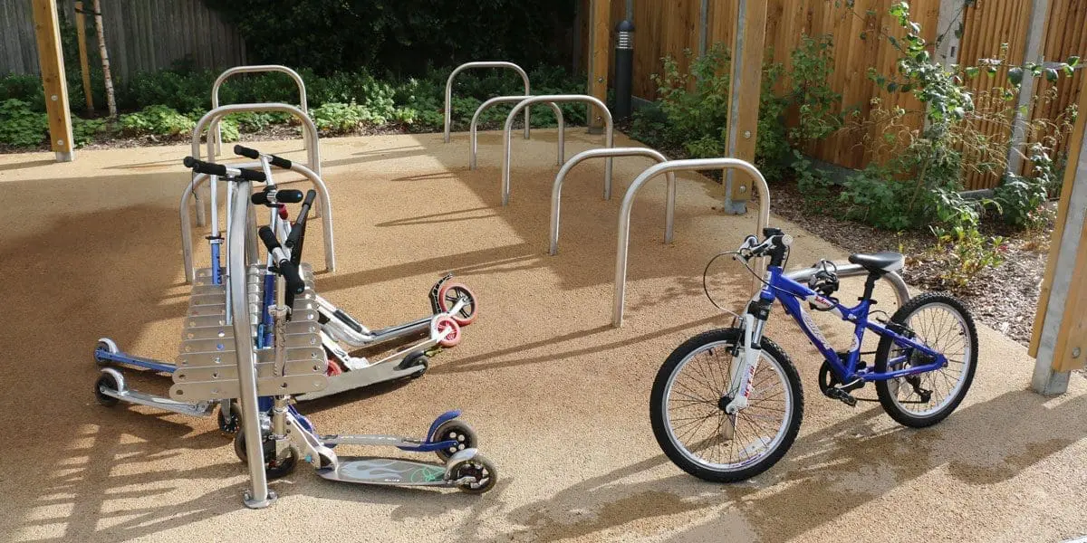 Outdoor metal bicycle and scooter parking racks