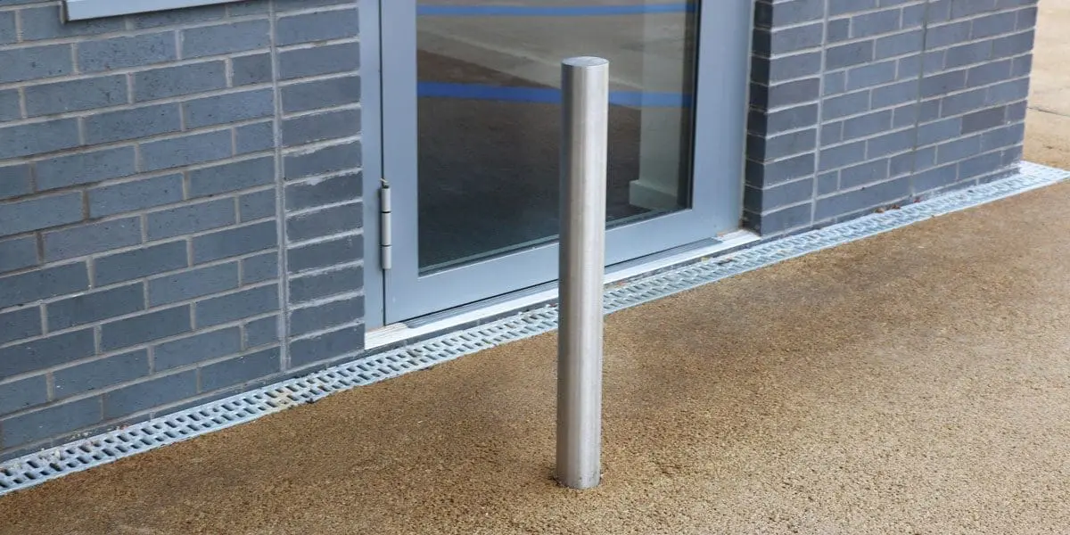 Outdoor metal door barrier bollard