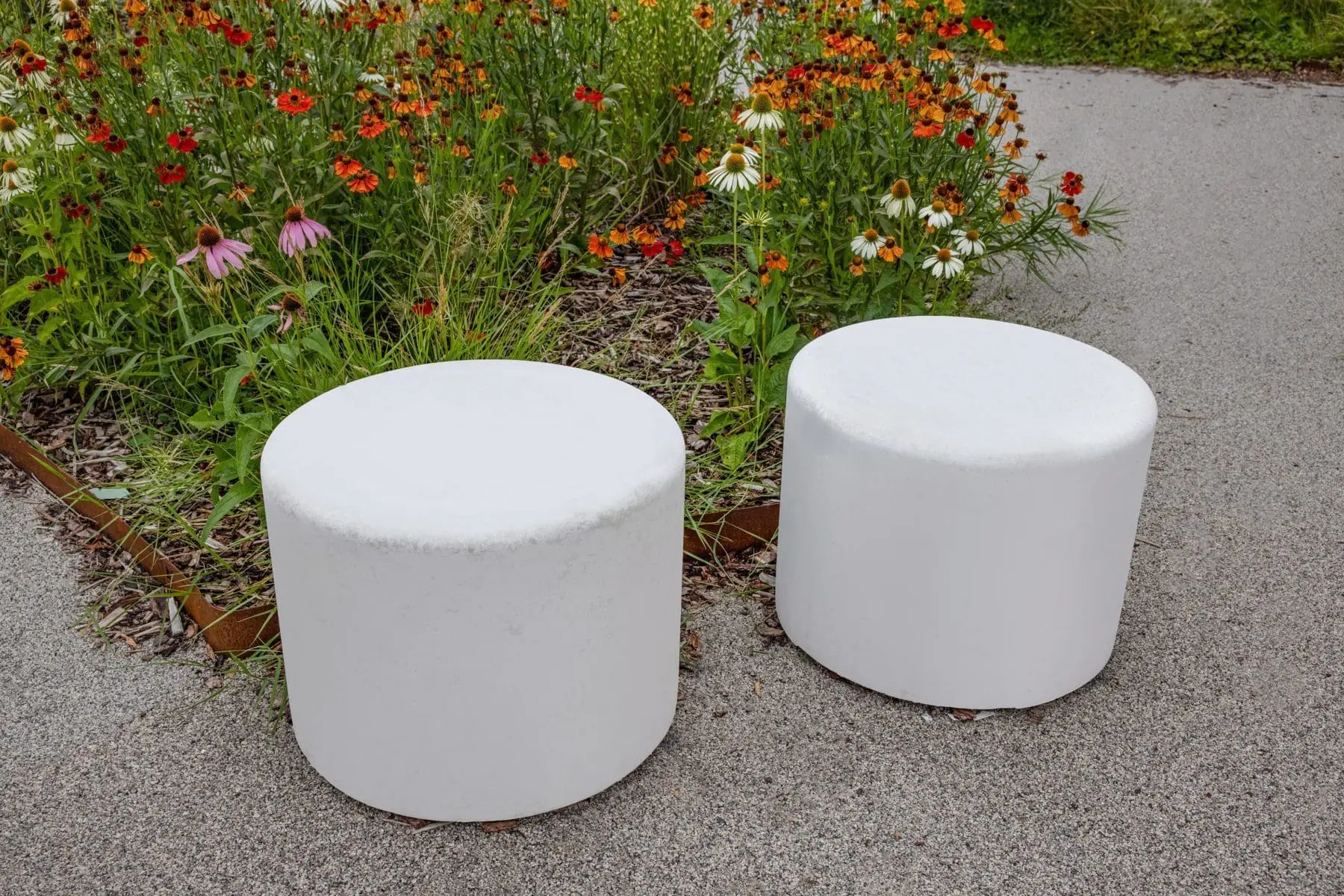 pair of circular concrete outdoor seats