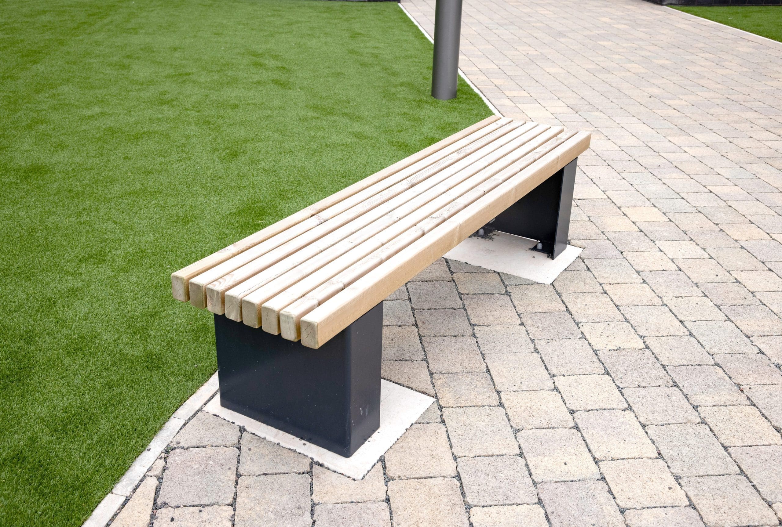outdoor-wooden-bench-with-black-plinths