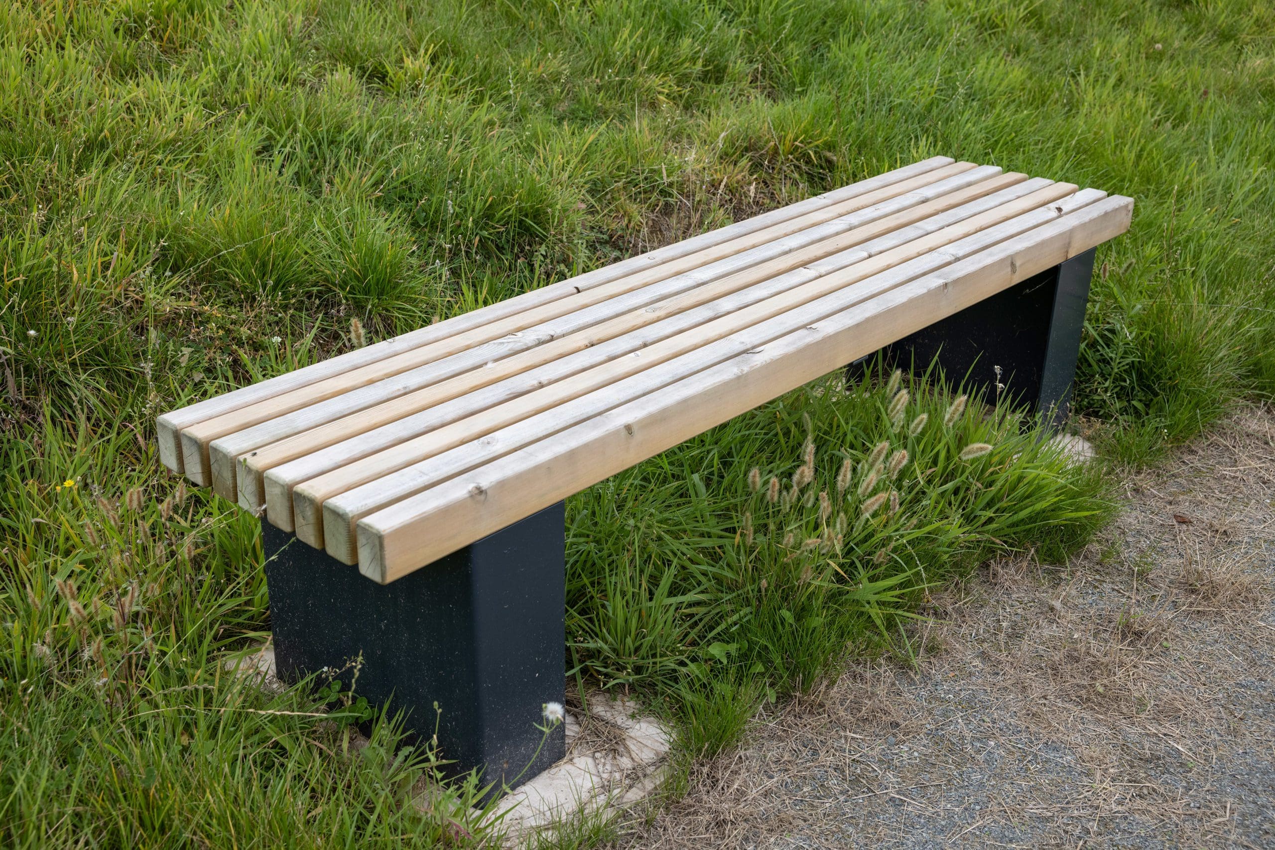 outdoor-wooden-bench-with-black-plinths