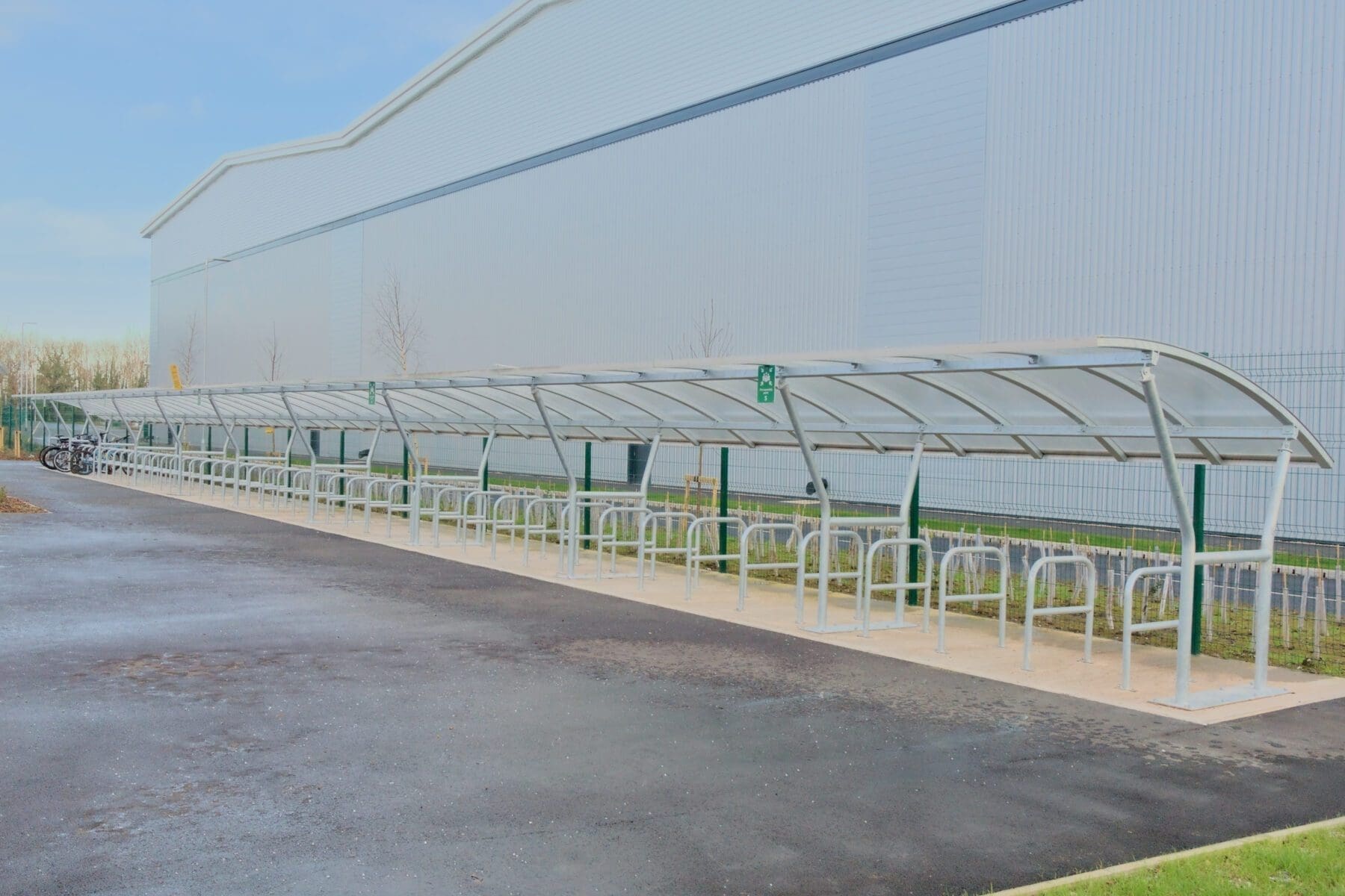 exterior shot of dhl warehouse with bike storage