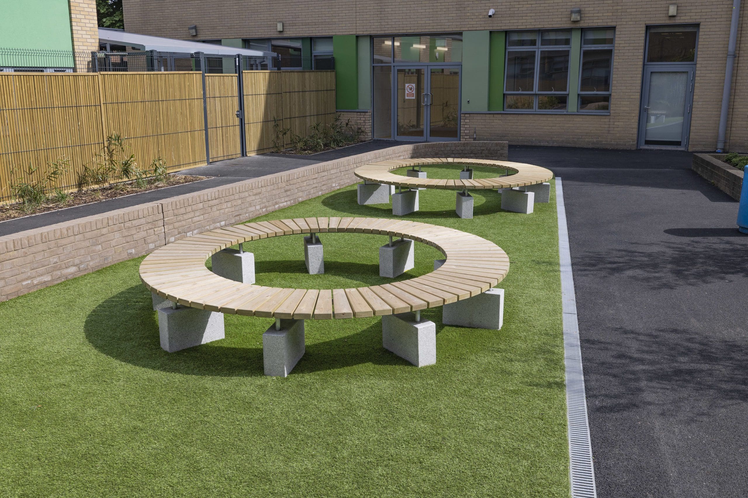 circle-wooden-benches-with-concrete-plinths