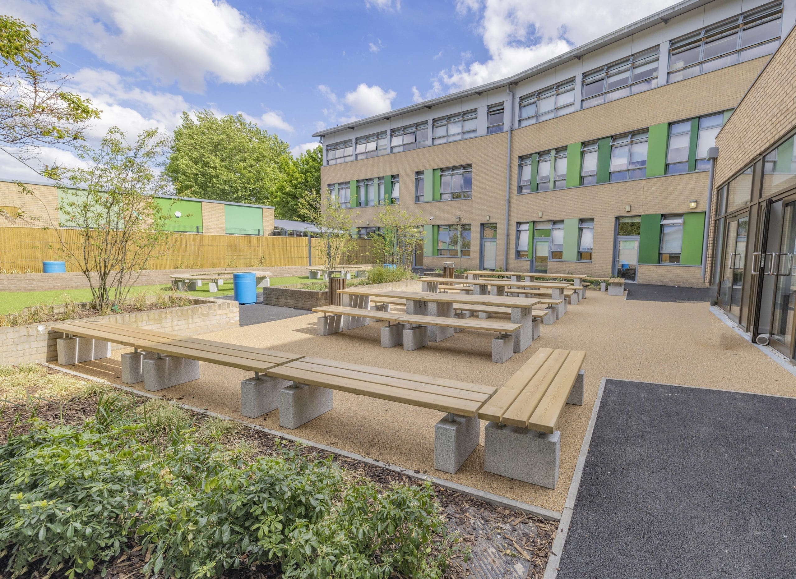 wooden-benches-and-matching-tables-with-concrete-plinths