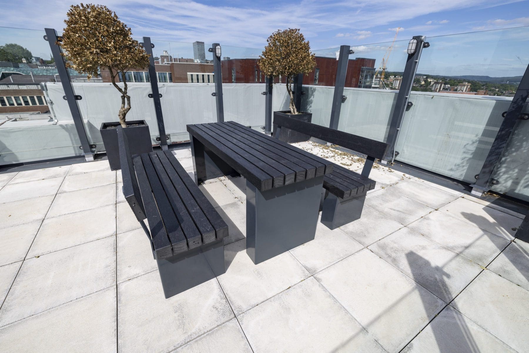 exterior-black-plastic-and-metal-benches-and-table