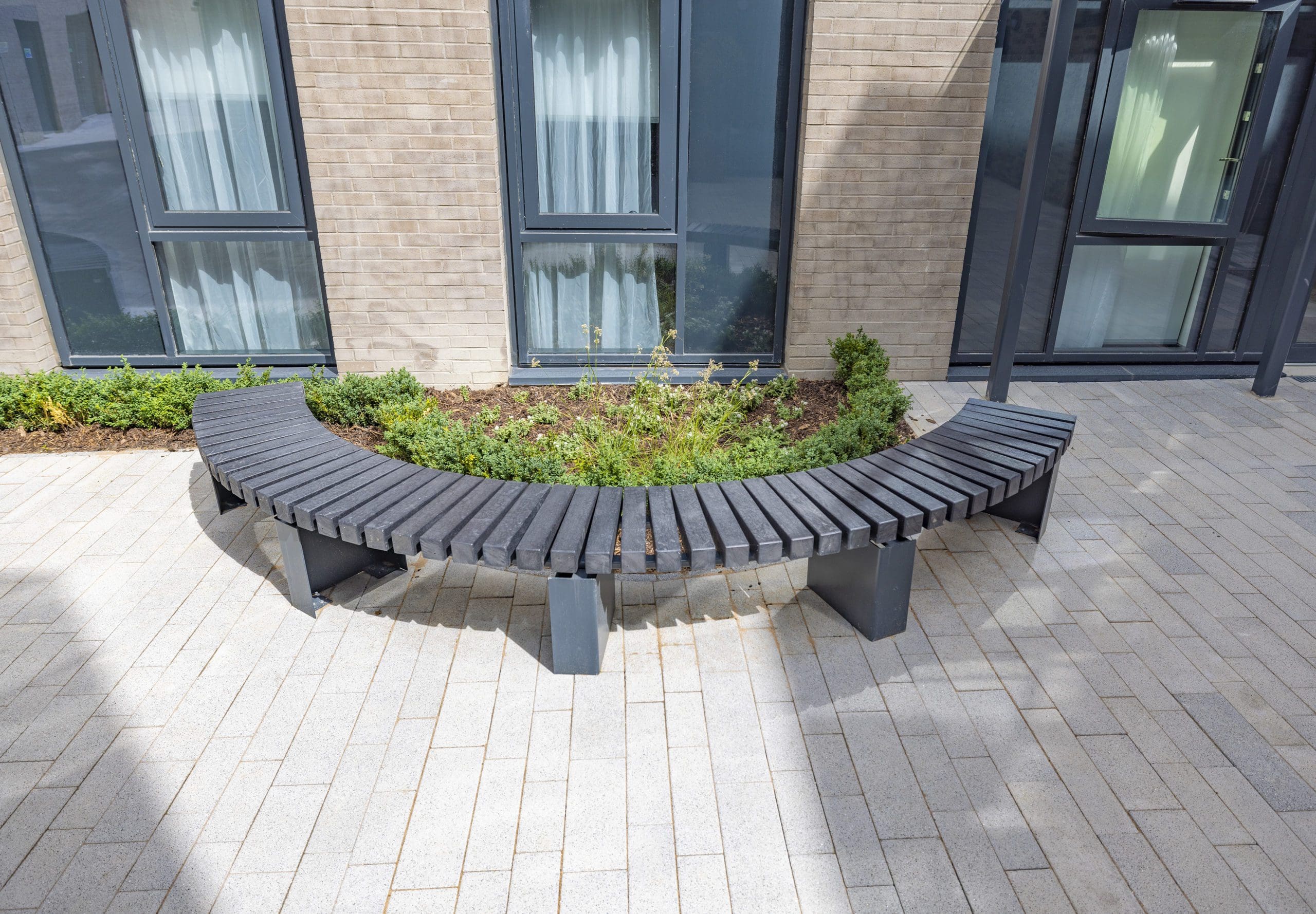 exterior-black-plastic-and-metal-curved-bench