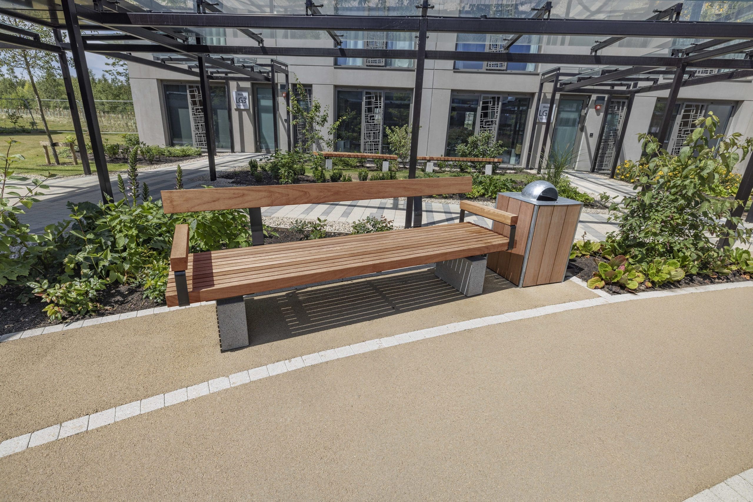 outdoor-wooden-bench-concrete-pillars-and-wooden-bin