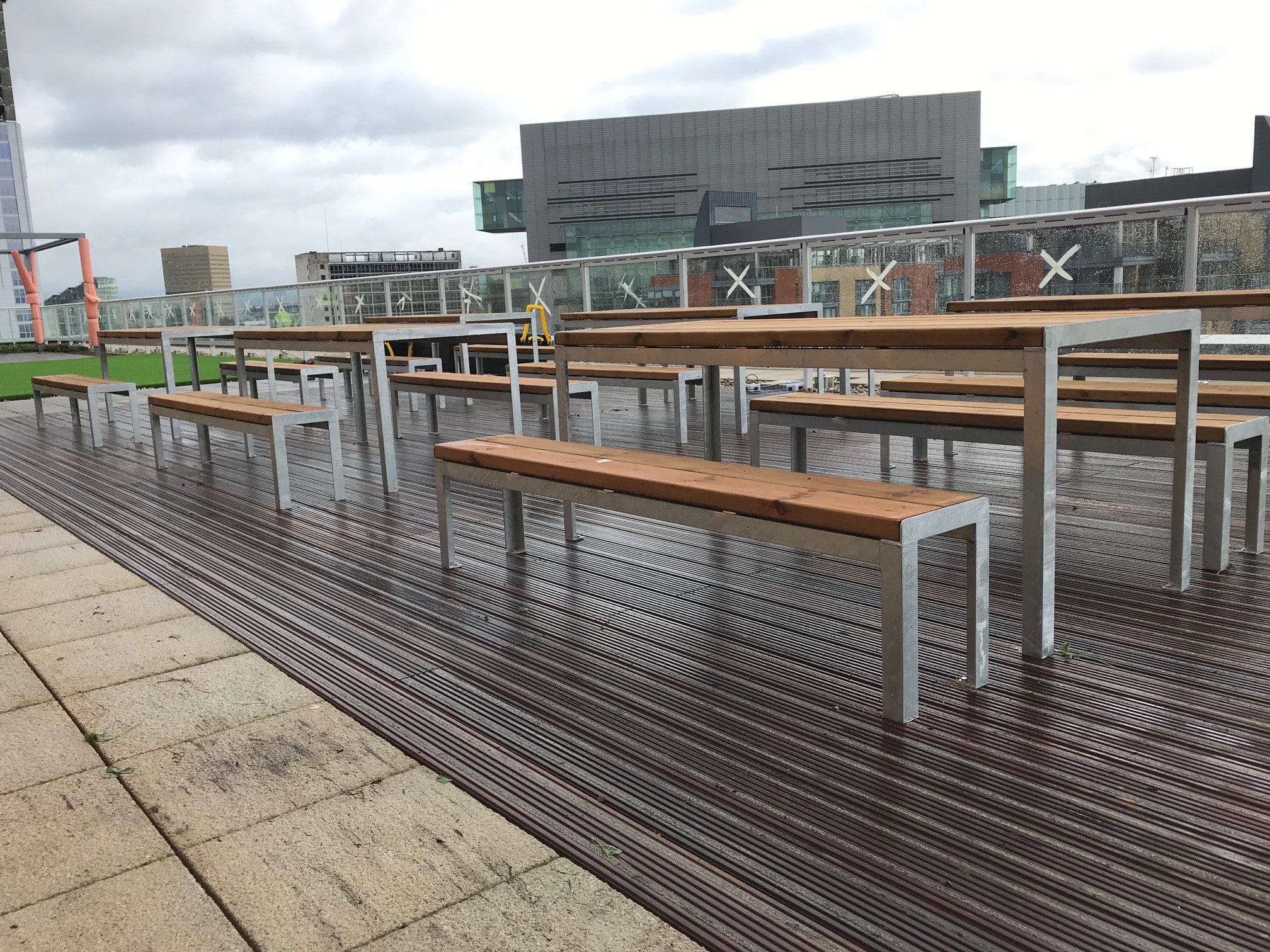 collection of wooden benches with metal legs