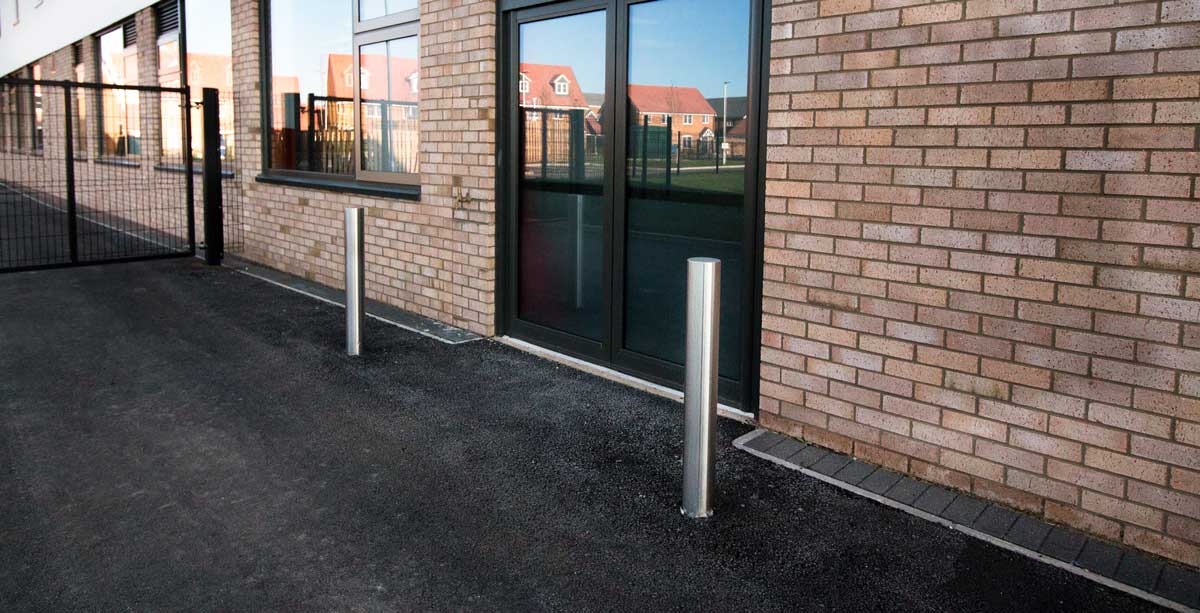 Metal exterior door barrier bollards