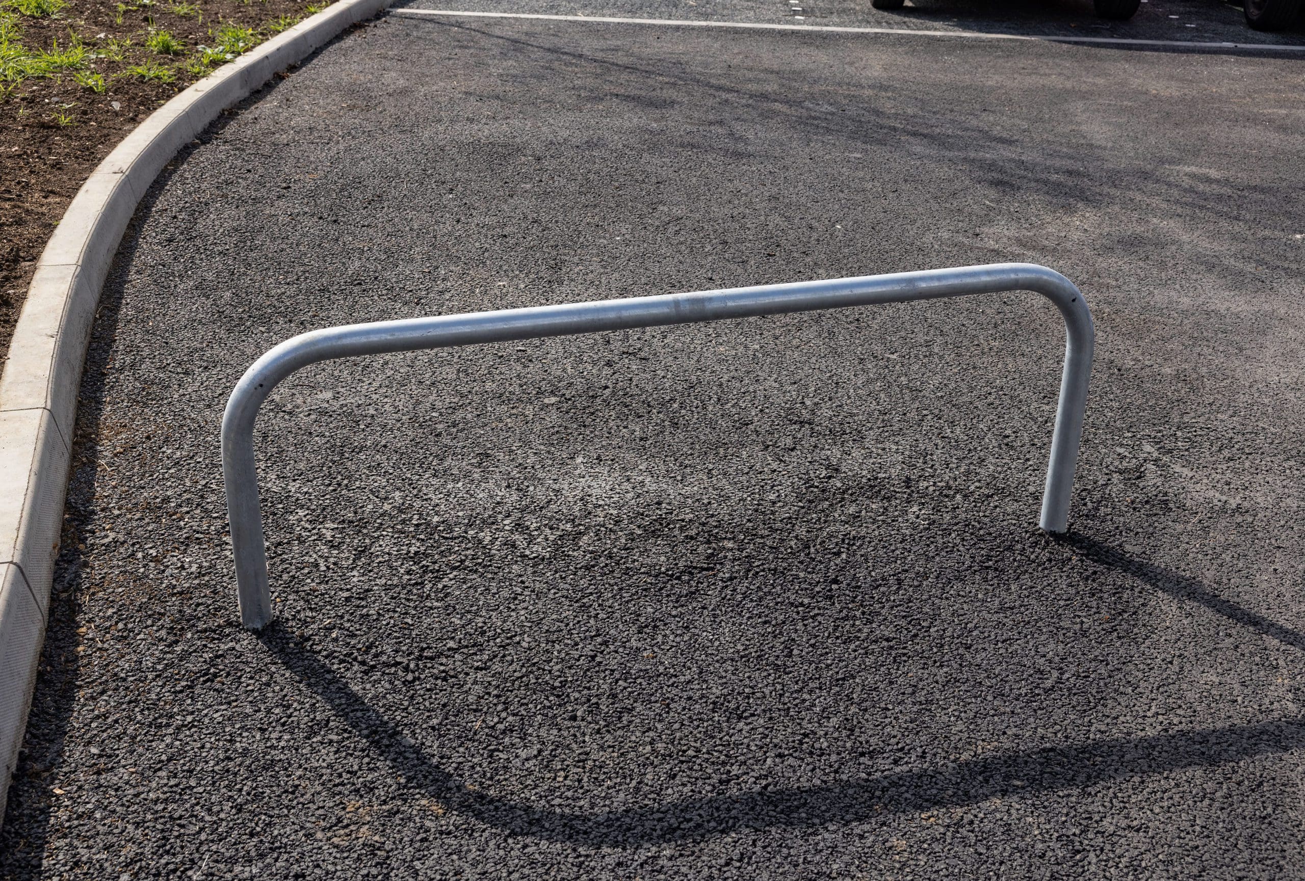 Exterior metal curved rectangular parking barrier