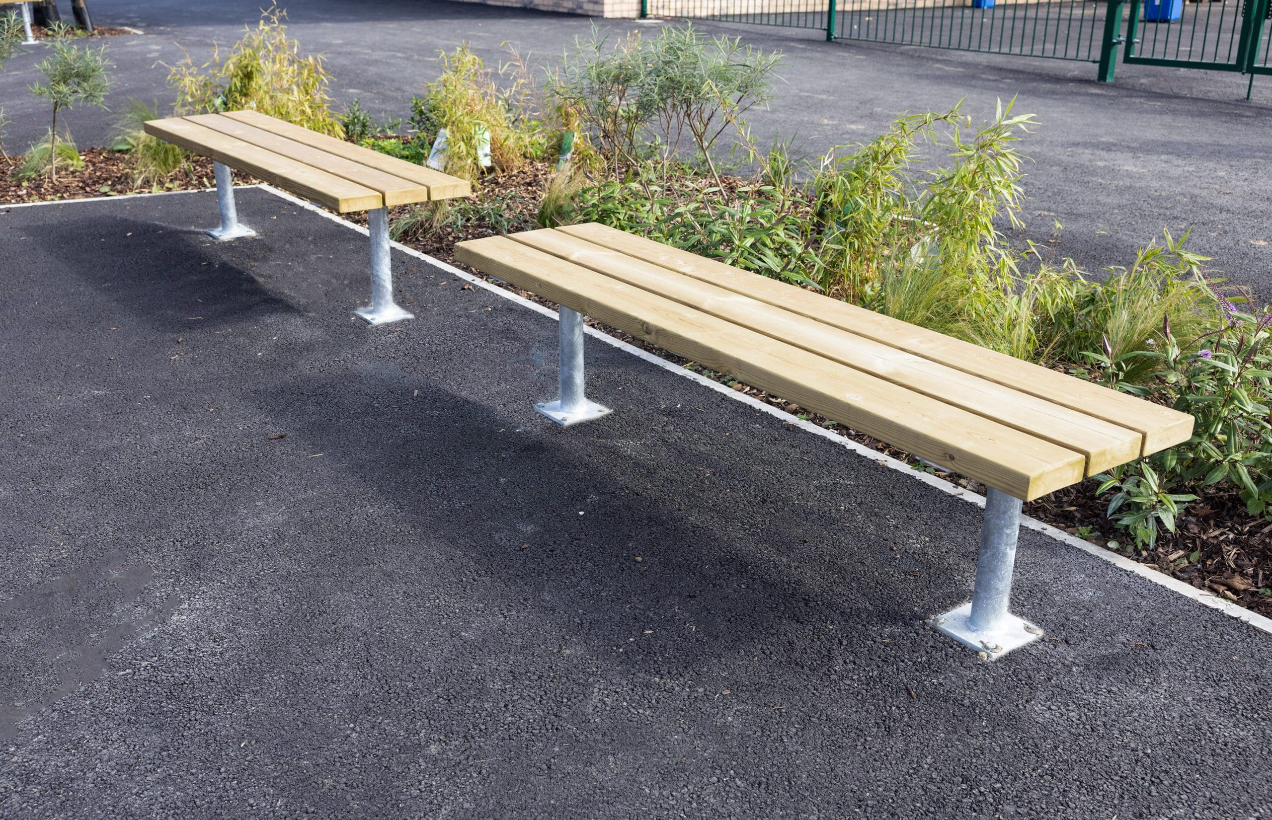 Outdoor rectangular wooden benches with metal legs
