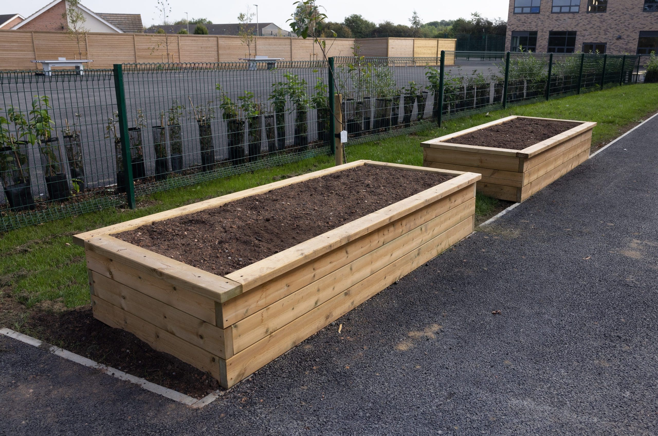 Large wooden rectangular raised beds planters