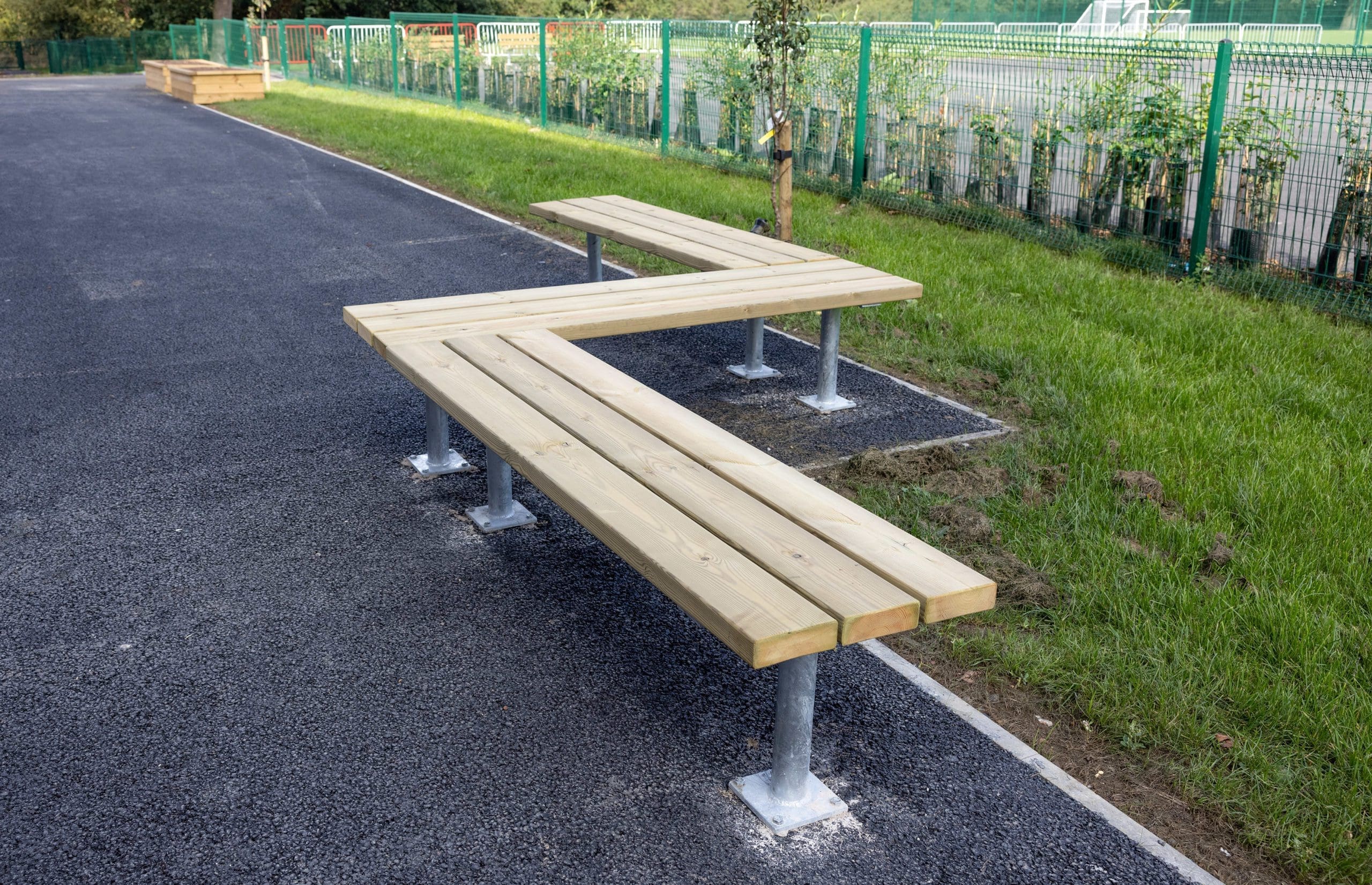 Z shaped wooden angular bench with metal legs