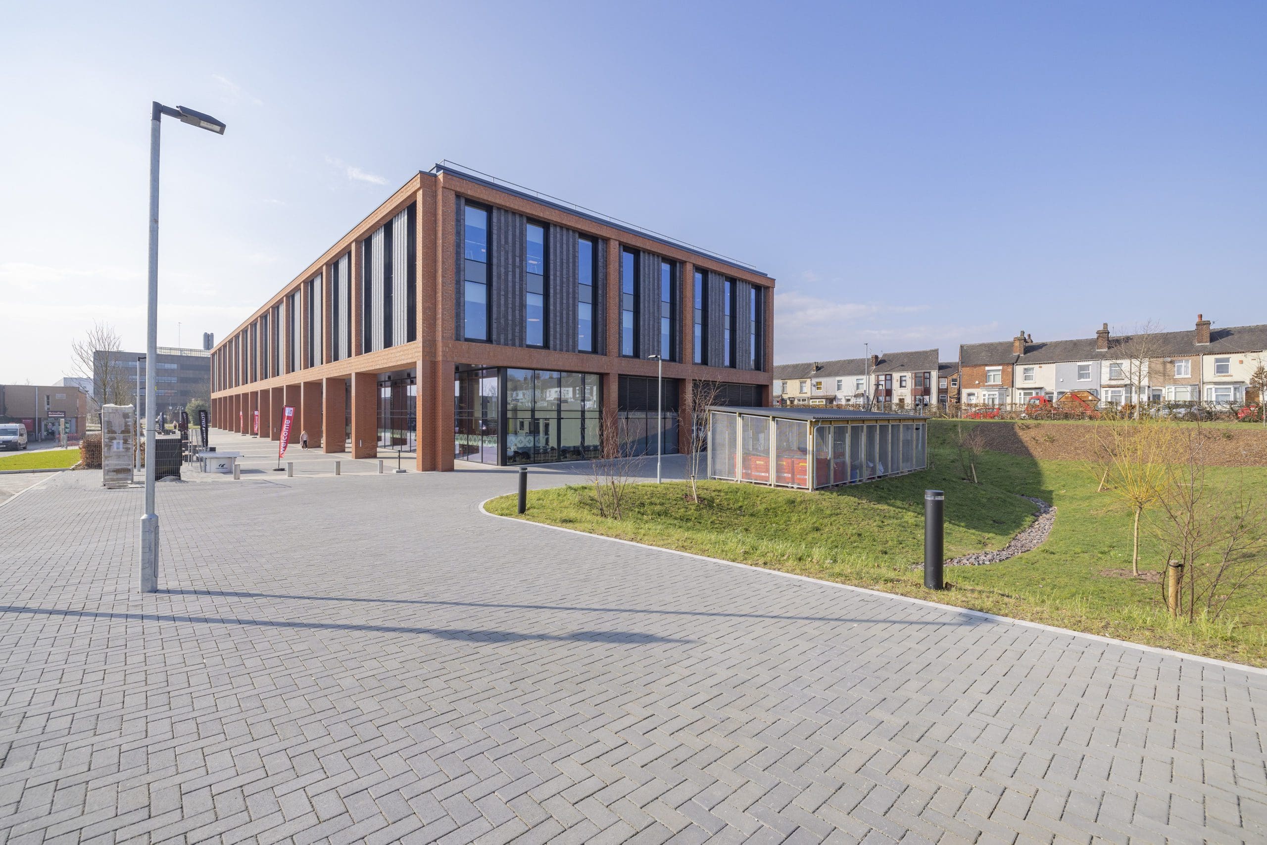 wide-shot-university-building-with-metal-external-storage-container