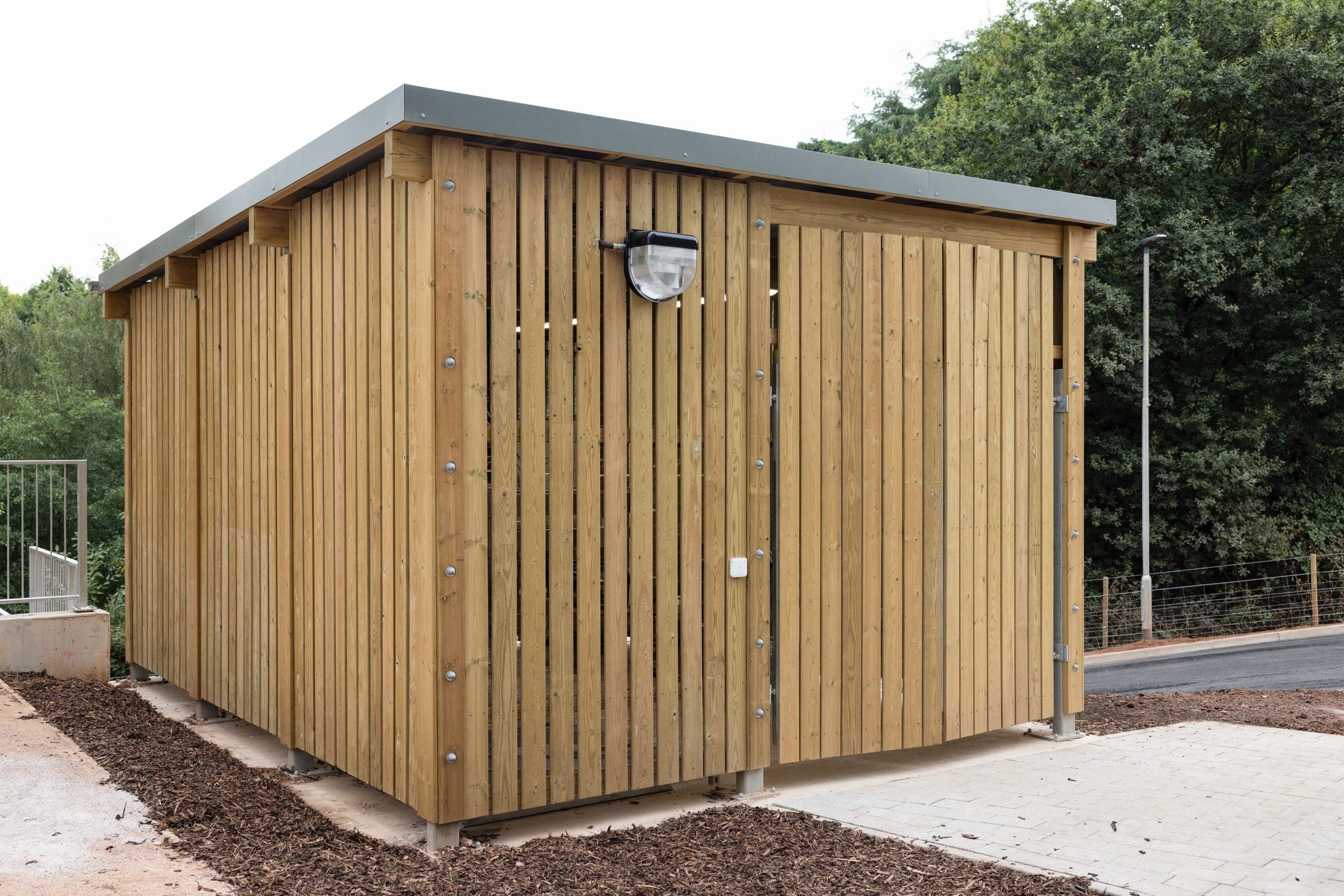 large wooden external cycle and bin storage unit