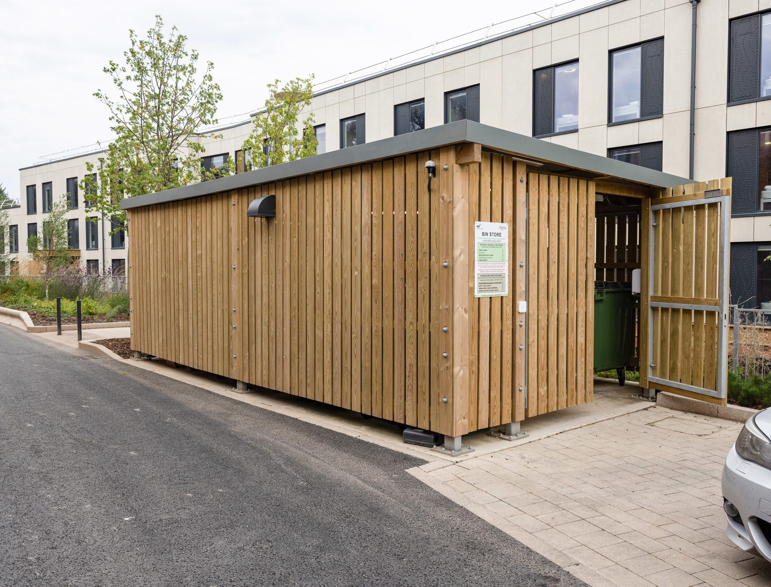 large wooden external cycle and bin storage unit