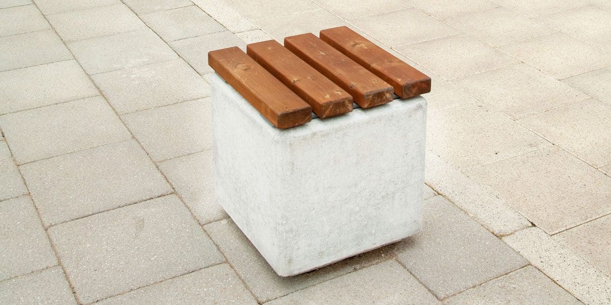 Square concrete individual seat with slatted wooden top