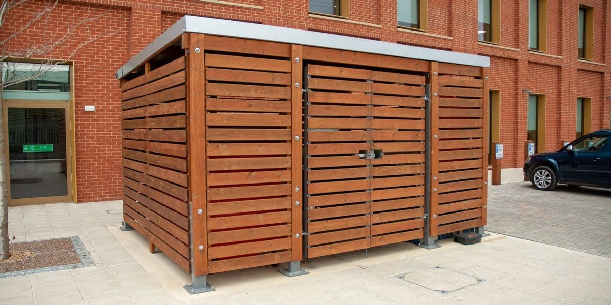 External wooden bin storage infront of store