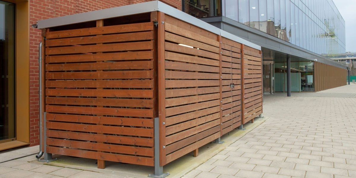 External wooden bin storage infront of store