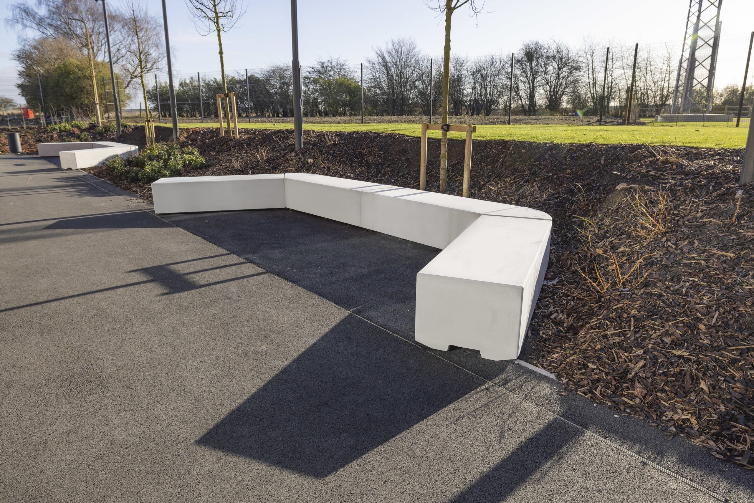 angled curved long concrete seating area