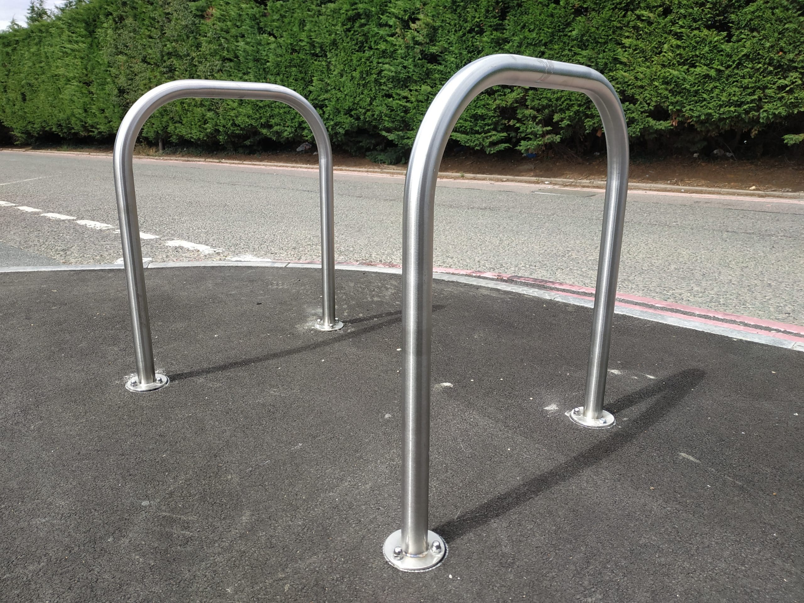 Silver metal bike secure hoops