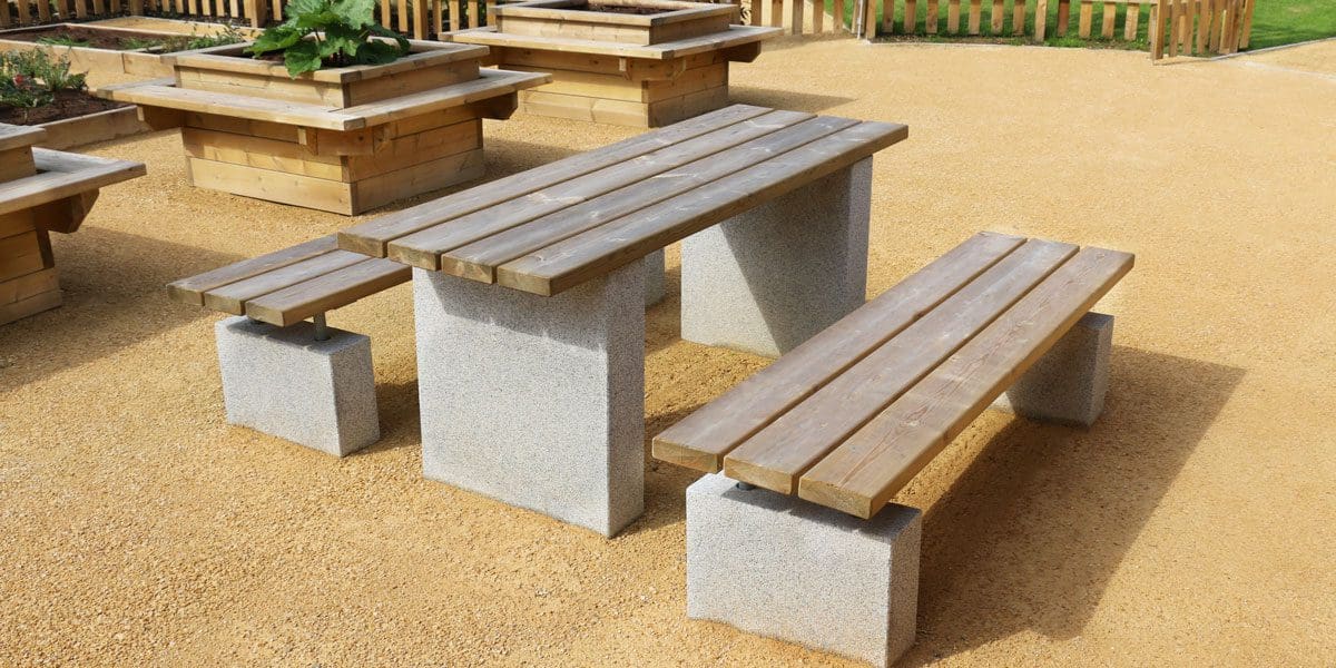 Wooden bench with matching table with concrete plinth legs