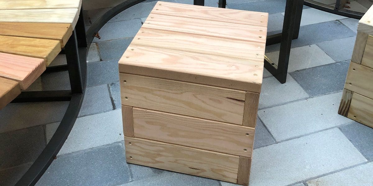 close up of wooden cube seat