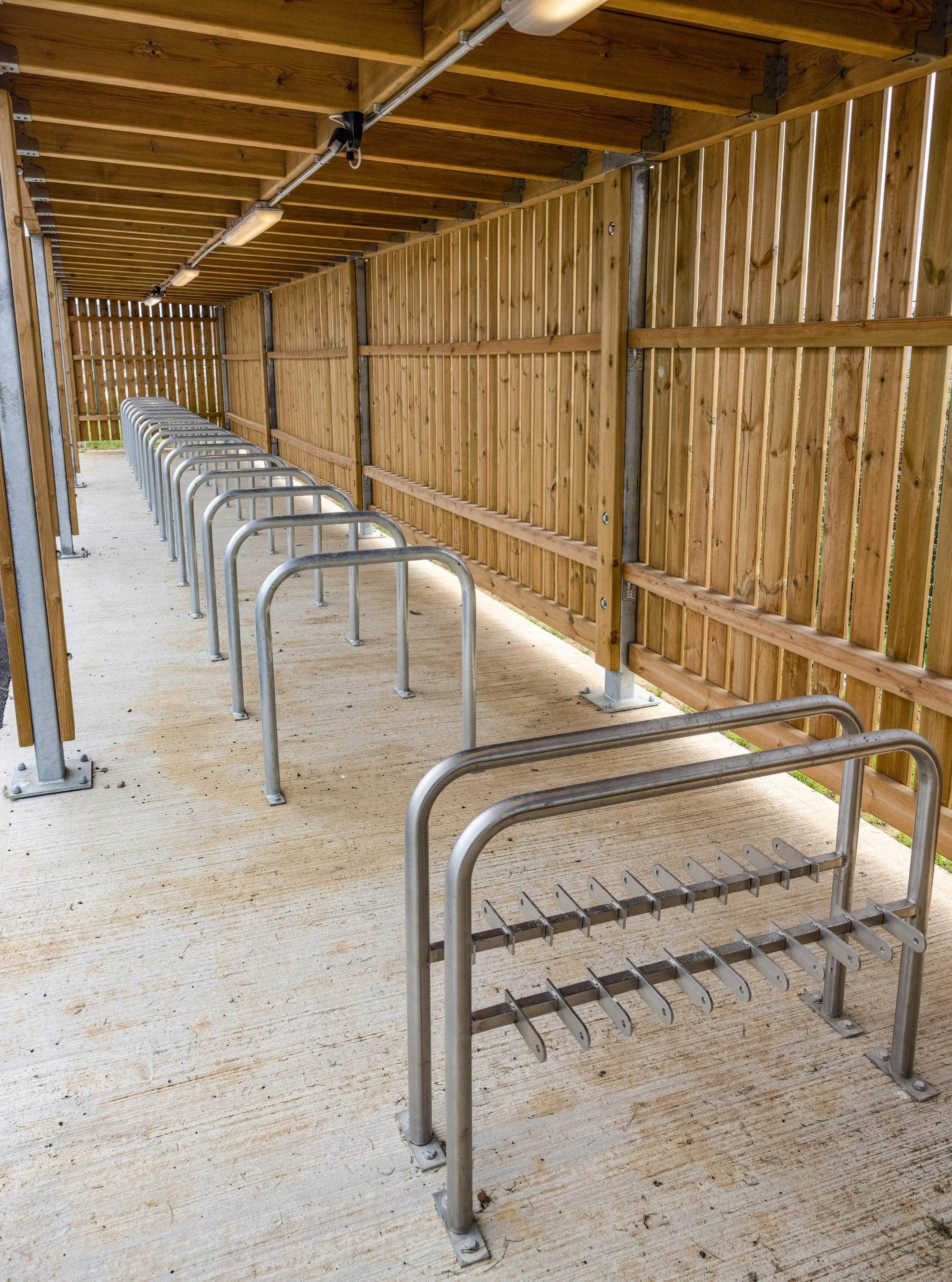 interior-of-wooden-bike-shelter-metal-bike-hoops