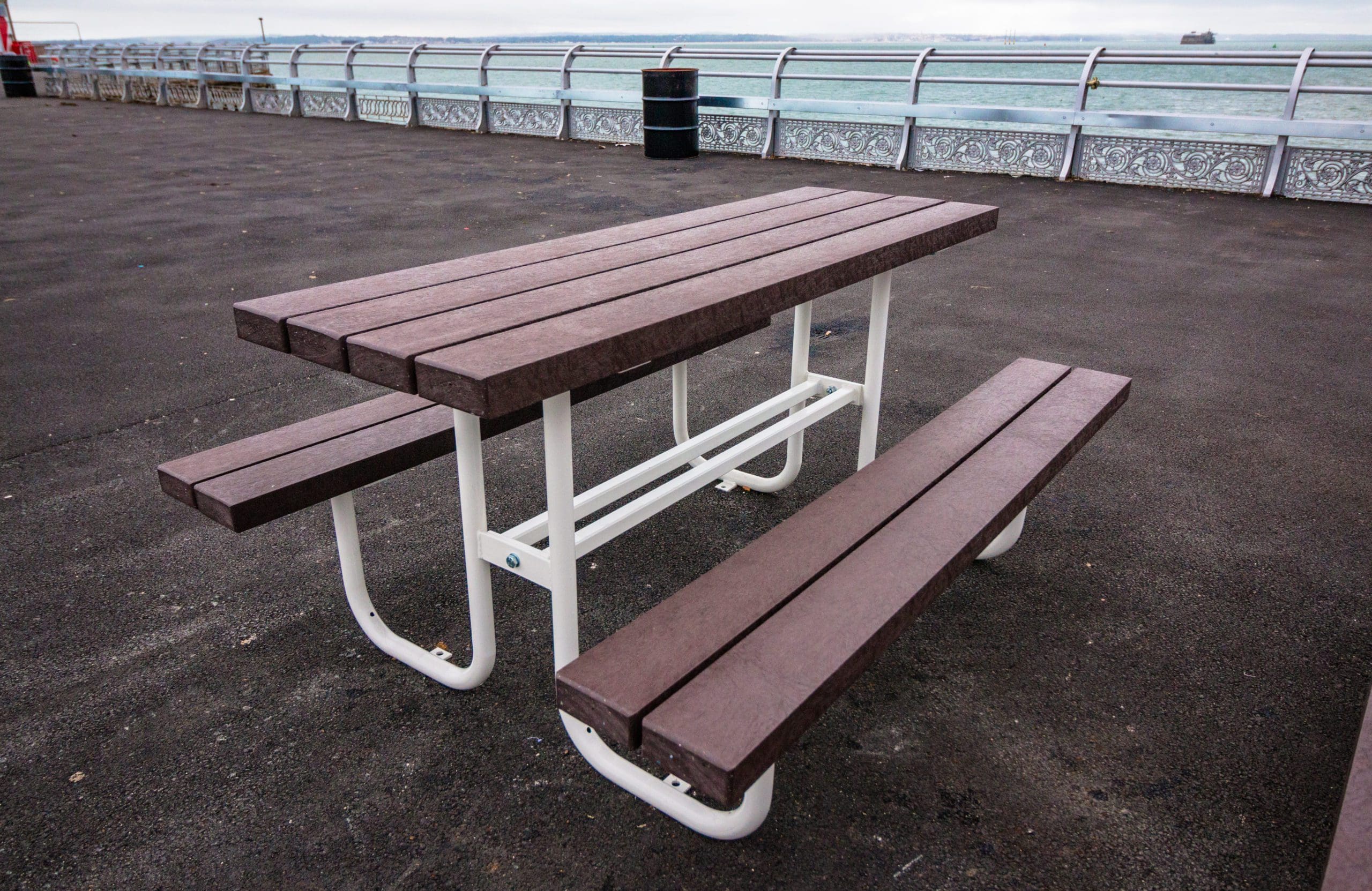 Outdoor wooden picnic table with metal legs