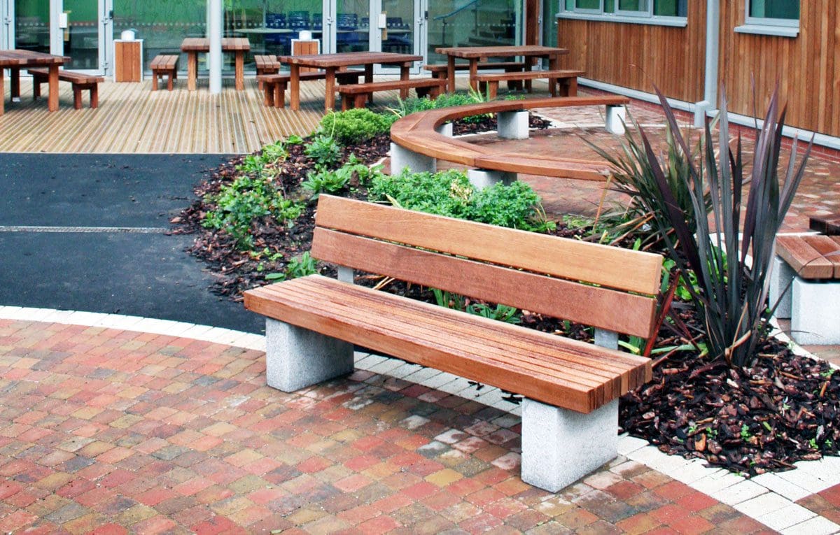 wooden benches with concrete plinth legs and wooden backs