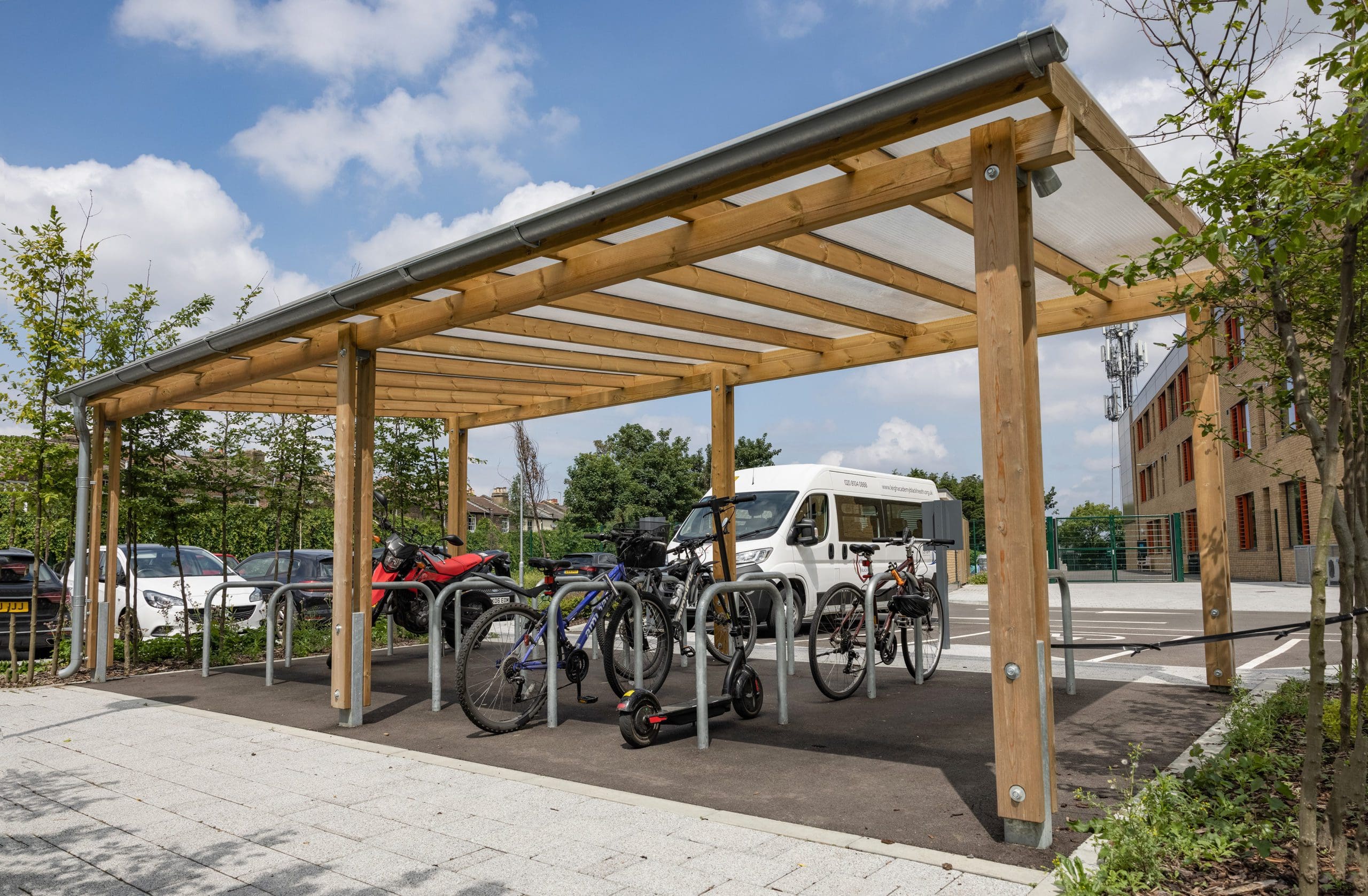 exterior-pergola-bike-storage-metal-curved-rings-in-the-ground