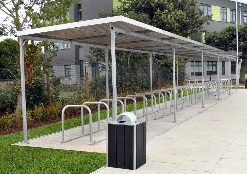 Exterior showing metal bike shelter with metal bike racks