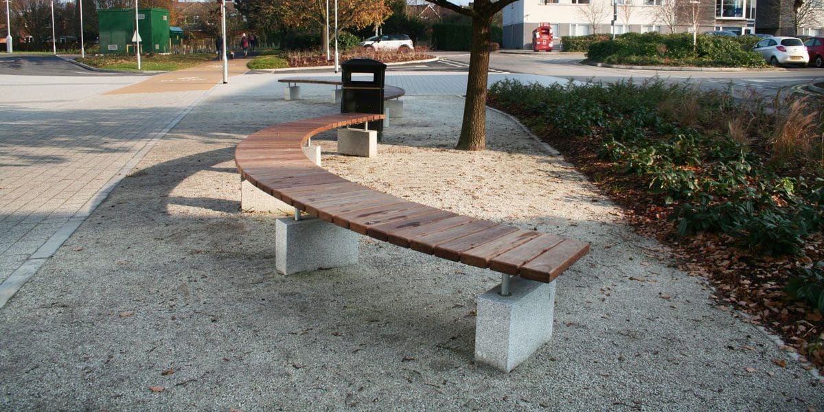 Outdoor wooden curved semi circle benches with concrete plinth legs