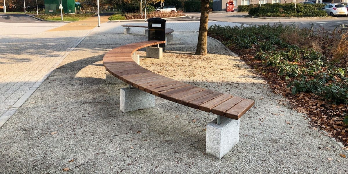 Outdoor curved semi circle wooden benches with concrete plinth legs