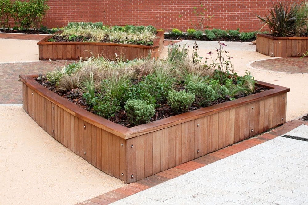 Angular wooden raised bed planters