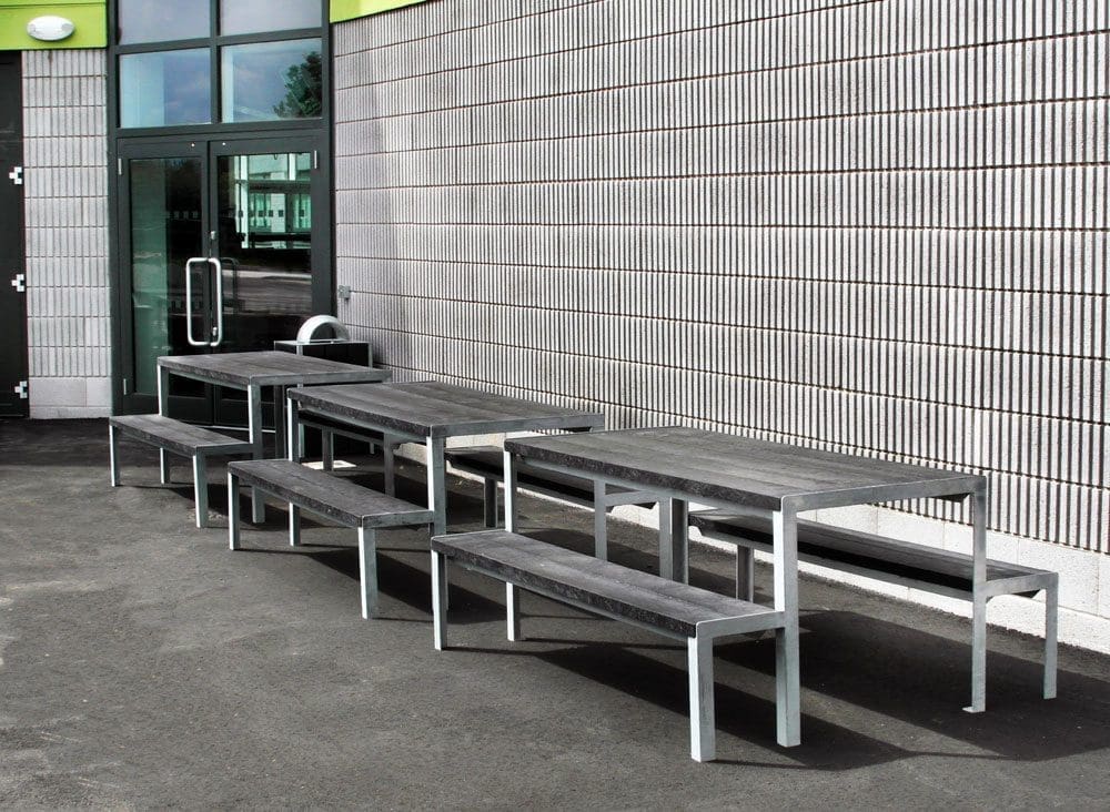 Black wood and silver metal outdoor tables and connected benches