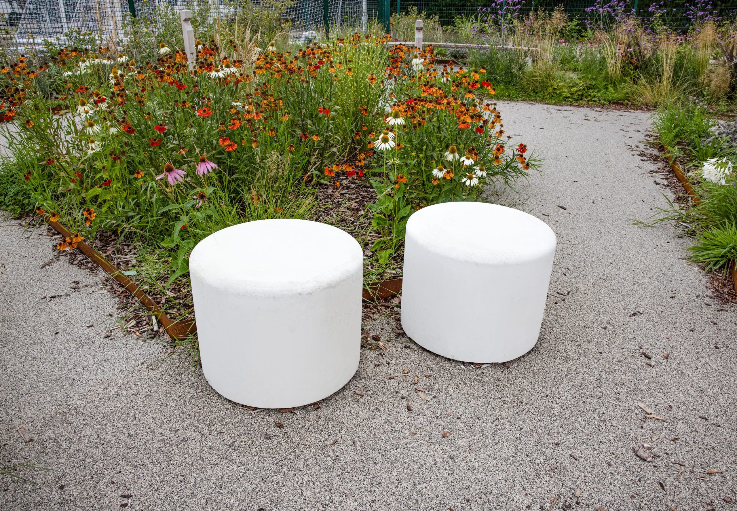 pair of circular concrete outdoor seats