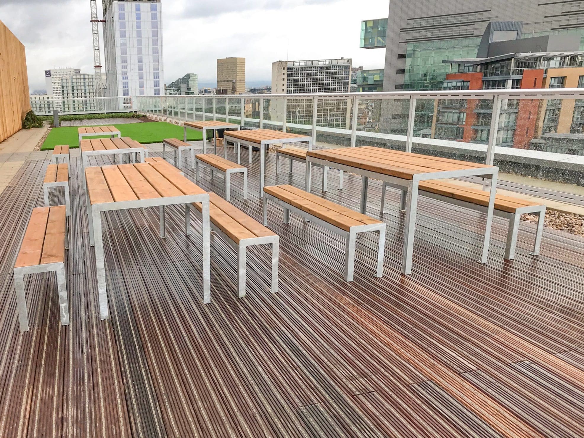 collection of wooden benches with metal legs