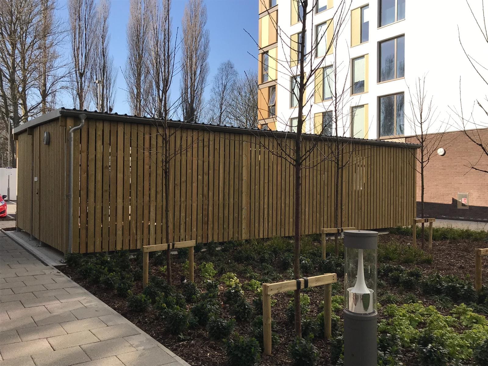 External wooden bicycle storage unit