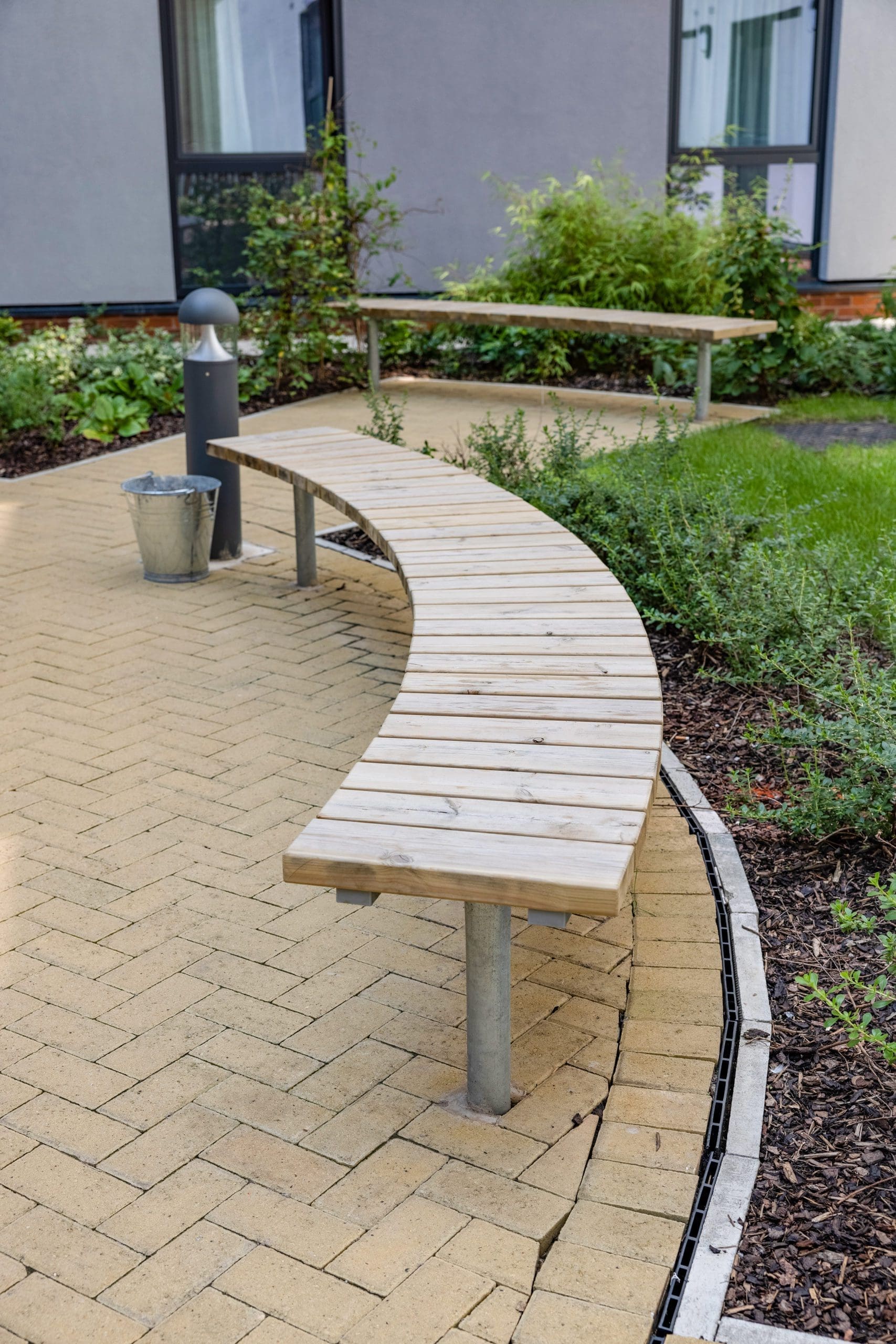 Semi circle curved wooden bench with metal legs