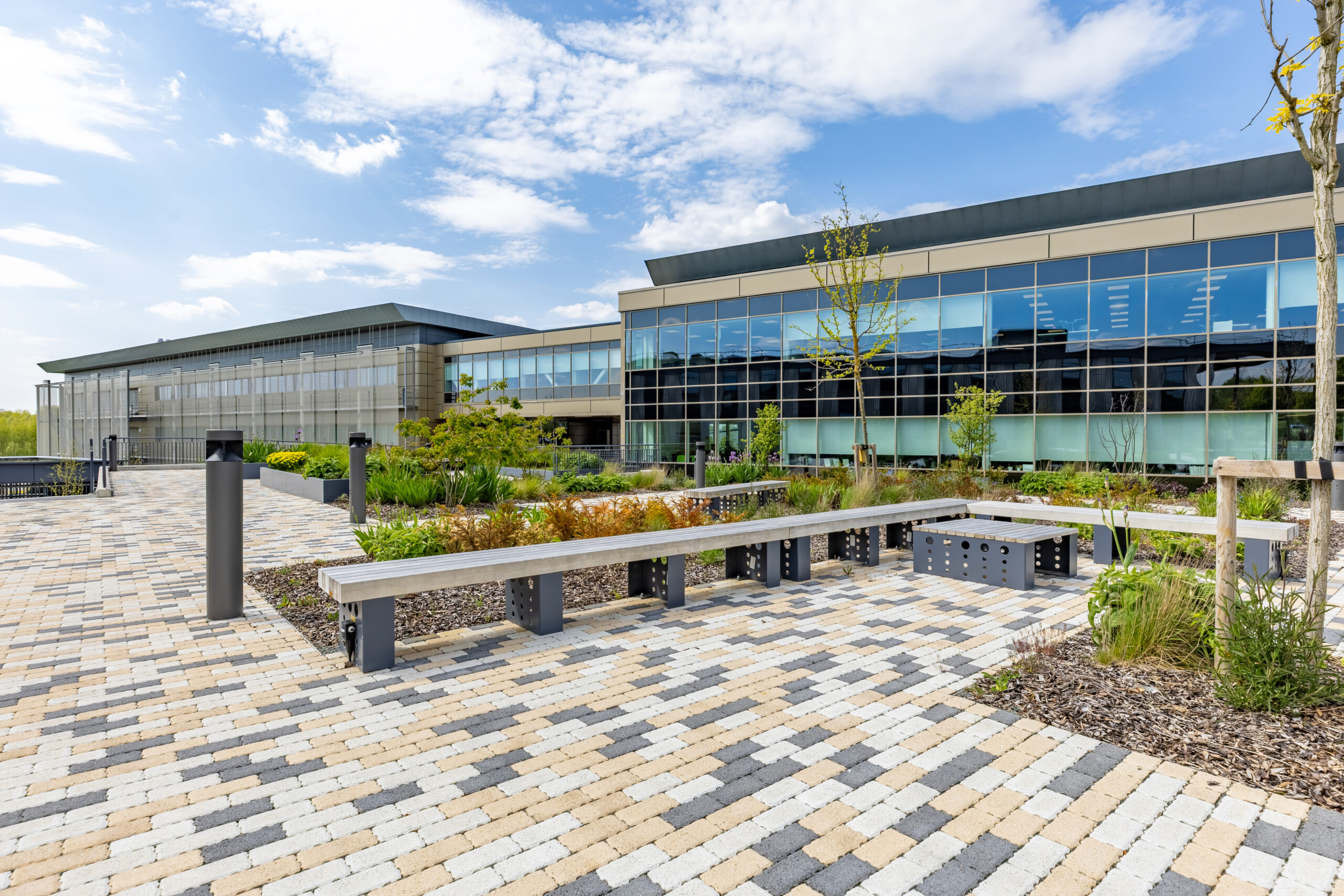 steel planters and integrated accoya seating