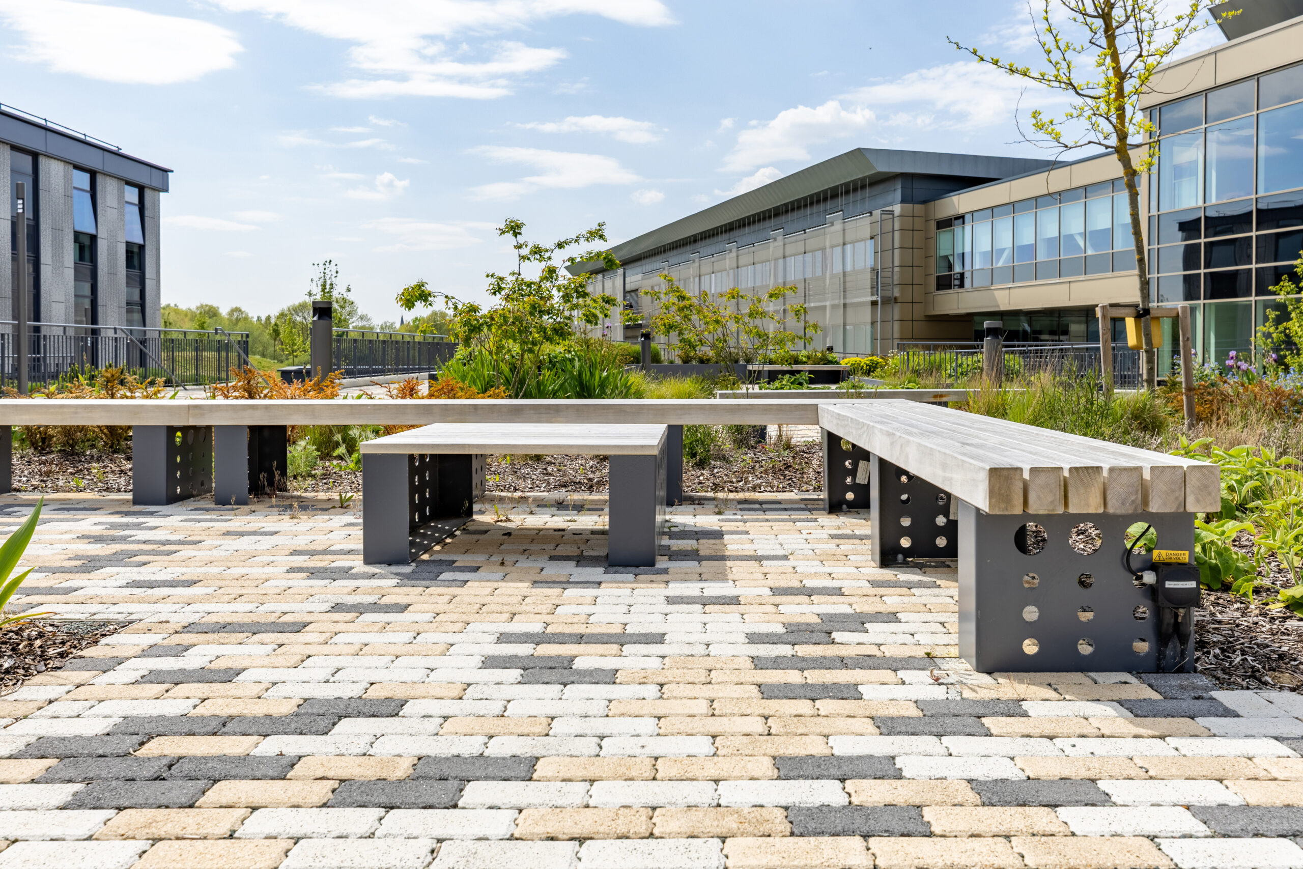 steel planters and integrated accoya seating