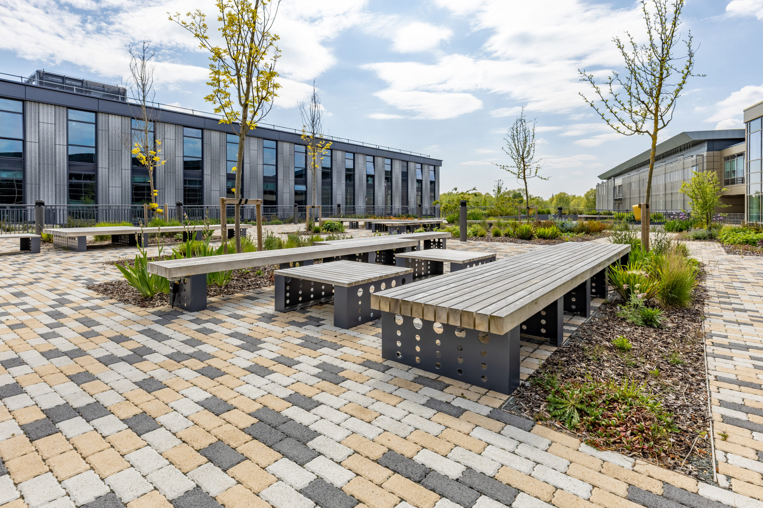 steel planters and integrated accoya seating