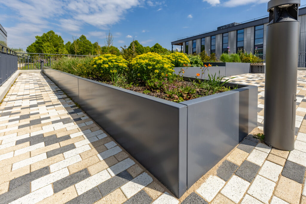 steel planters and integrated accoya seating